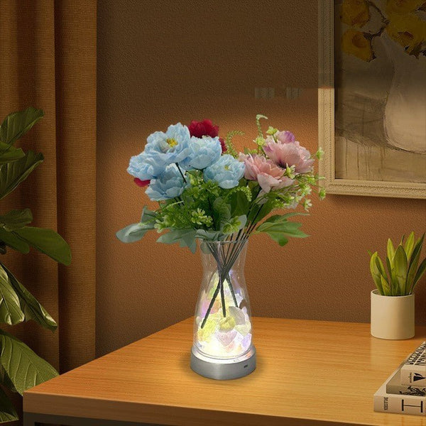 Magic color‑rotating LED vase lamp brightens your home with charming visuals.